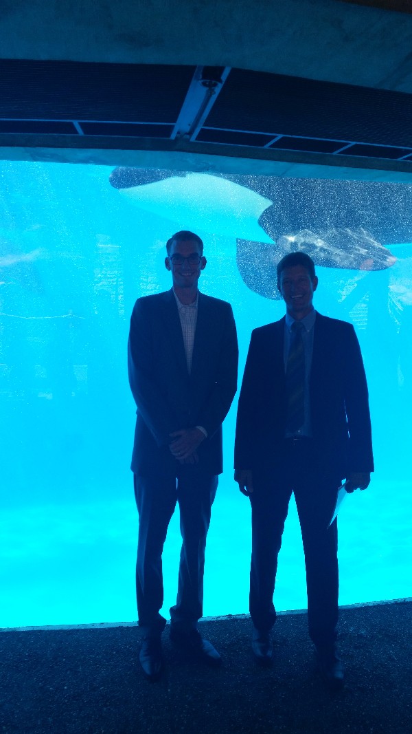 A whale photobombs Chapter President Jesse Hamilton (l) and Awards Chair Bob Walters at SeaWorld during the September luncheon that the chapter helped sponsor.